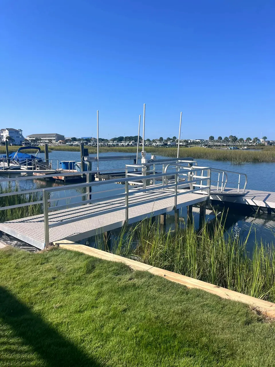 After: new aluminum walkway, gangway and dock beside boat lifts