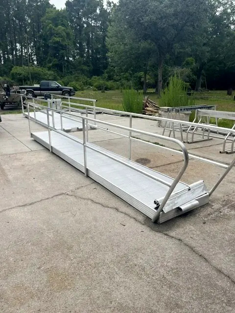 Long aluminum gangway with handrails finished and waiting for delivery
